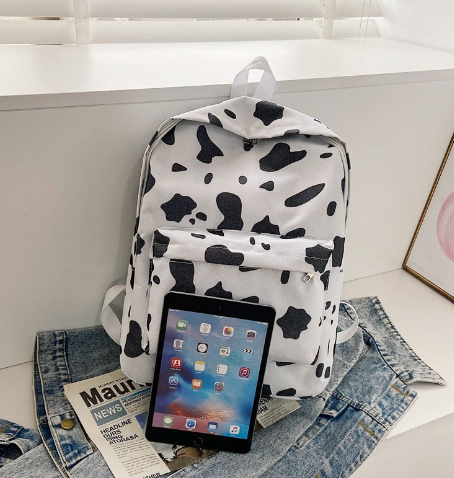 Cow print canvas bag side view