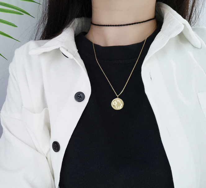 Abstract Face Necklace Image 2
