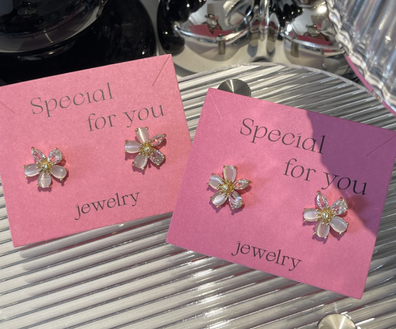 Close-up of flower earrings