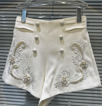 Model wearing the shorts in a stylish setting