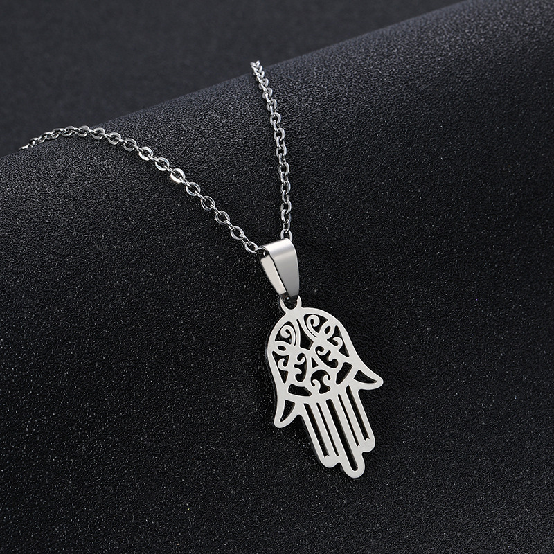 Close-up of Hand Gesture Pendant