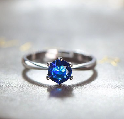 Diamond-studded ring with pink zircon