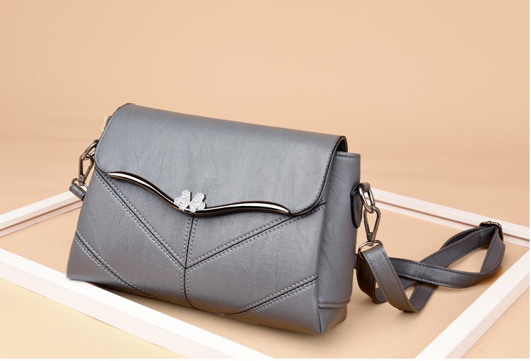 Bolso bandolera morado