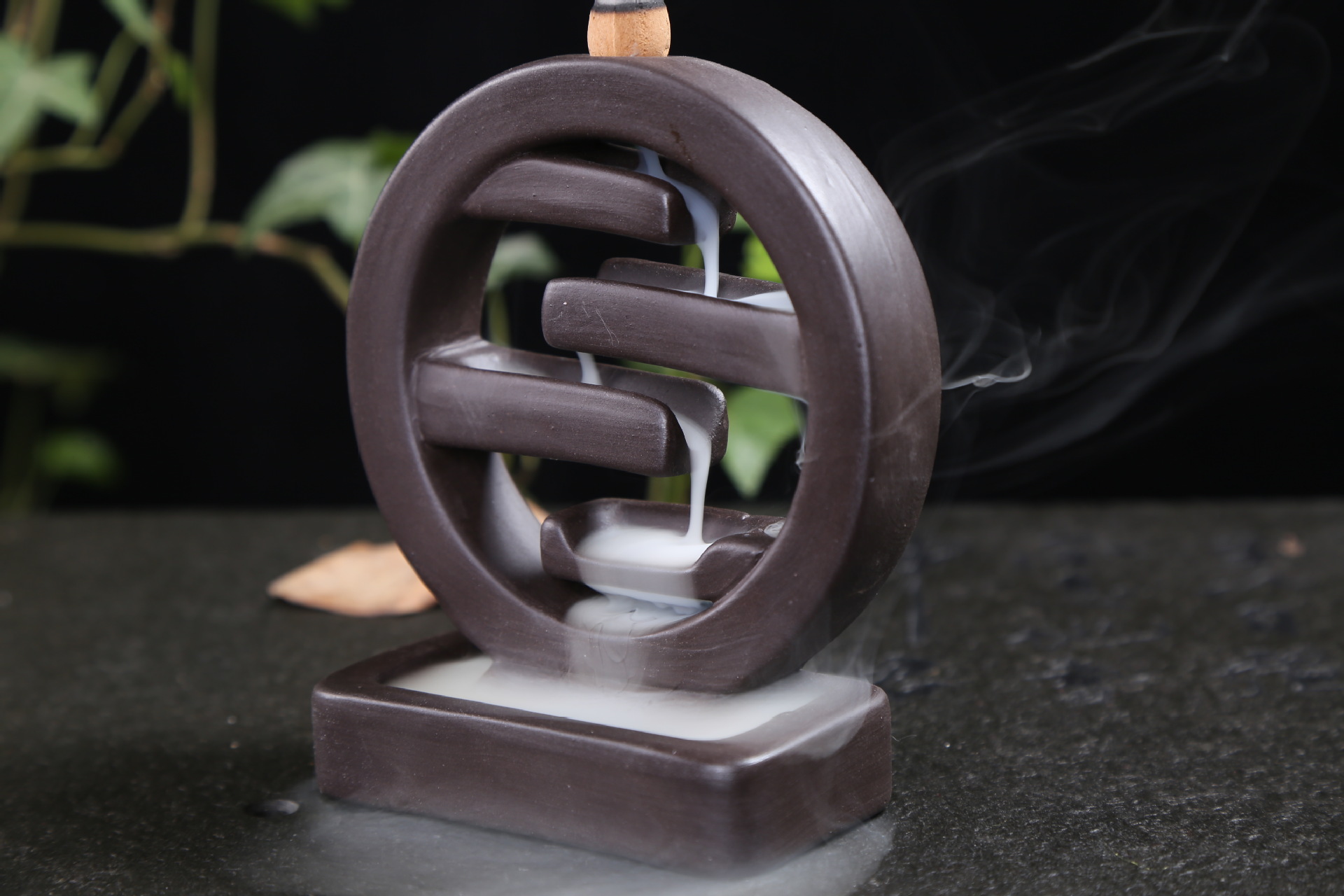 Backflow Incense Burner in use