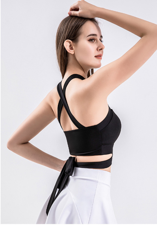 Model wearing backless top