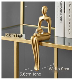 Golden Sitting Abstract Sculpture