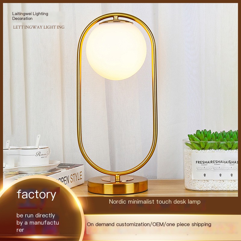 Nordic Glass Sphere Ambient Light in Gold and Black