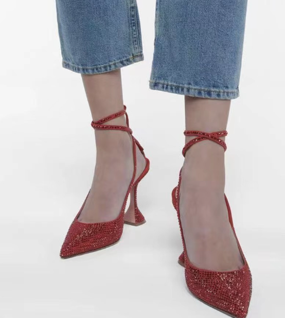 High-heeled shoes in green