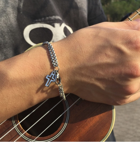 Stylish display of the Stainless Steel Cross Bracelet
