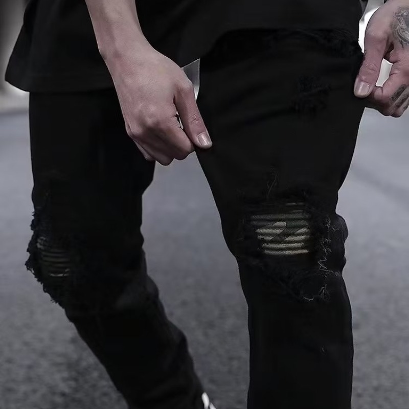 Slim-fit zippered jeans close-up
