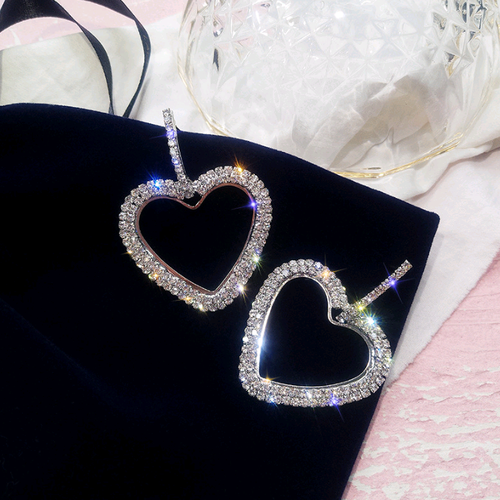 925 Silver Heart-Shaped Ear Studs - Image 1