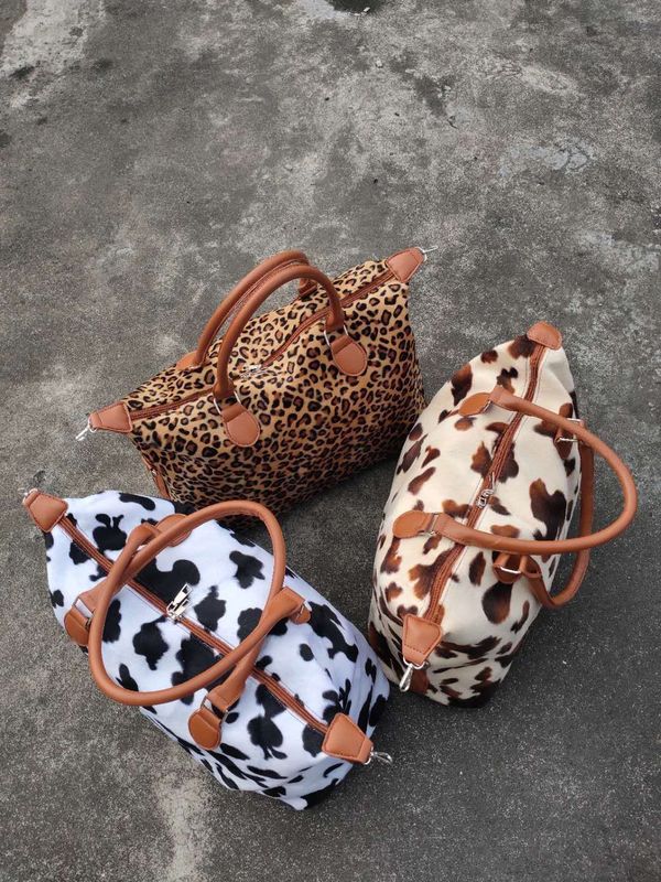 Black Cow Print Travel Bag