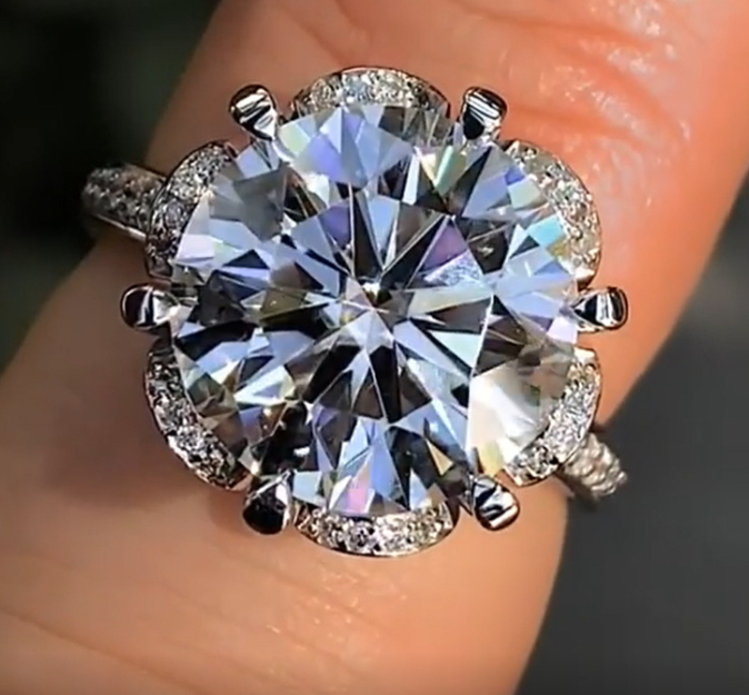 Classic Six-Petal Flower Zirconia Engagement Ring Image 1