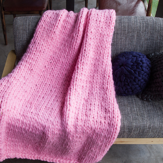 Hand knitted wool blanket