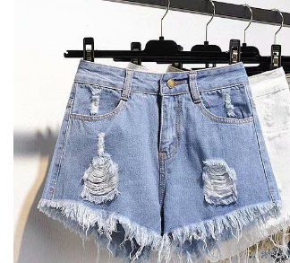 High-waisted ripped denim shorts
