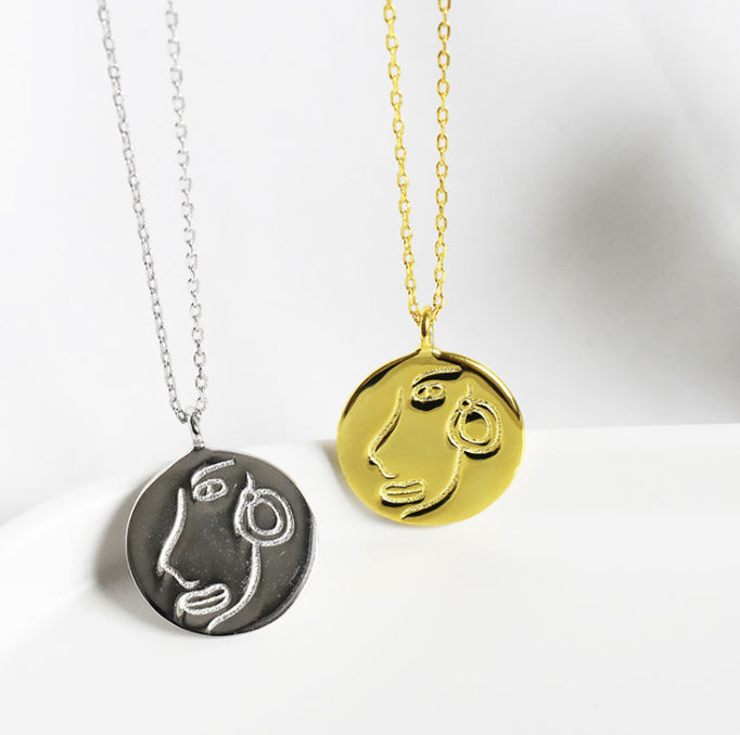 Abstract Face Necklace Image 1
