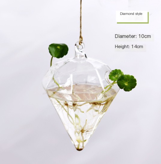 Jarrón de cristal con forma de diamante