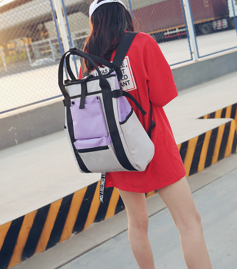 Grauer und lila Canvas-Rucksack
