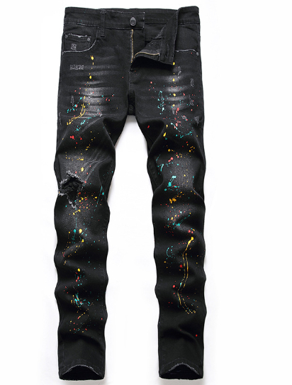Imagen 2 de jeans con pierna elástica rota y salpicada de grafitis
