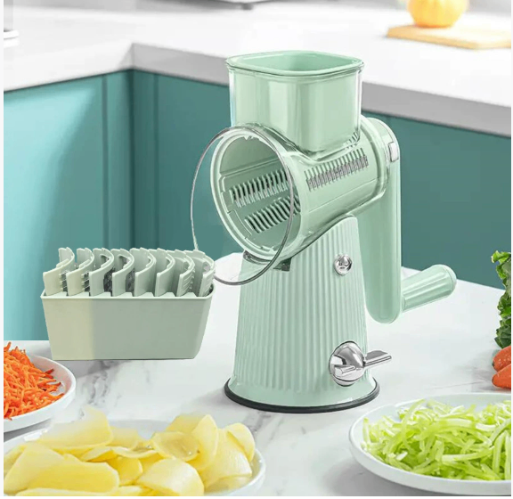 Multi-functional vegetable cutter with hand-operated rocker-style cutting mechanism image