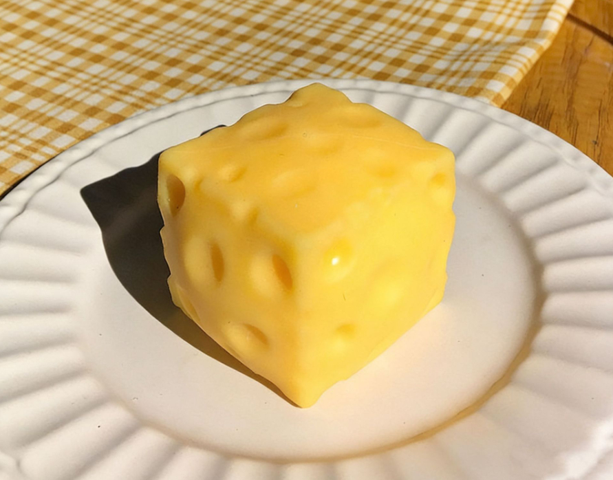 Simulated cheese squeeze toy for stress relief