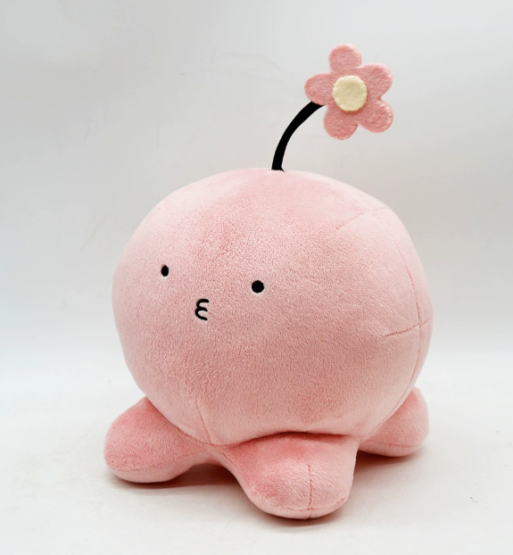 Cute fluffy pink plush toy image