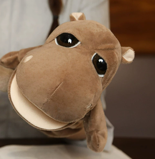 A variety of plush animal hand puppets