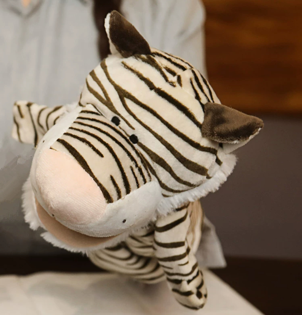 A variety of plush animal hand puppets