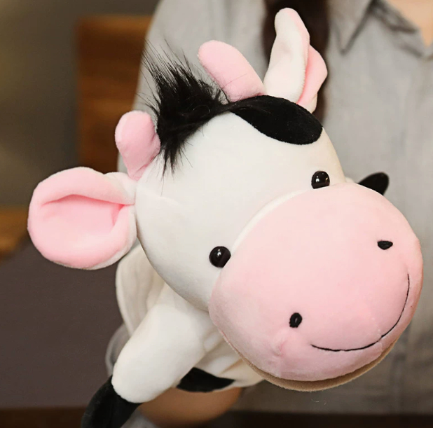 A variety of plush animal hand puppets