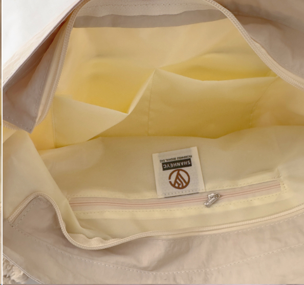 Large capacity water-repellent nylon bag for women, everyday commuting shoulder bag
